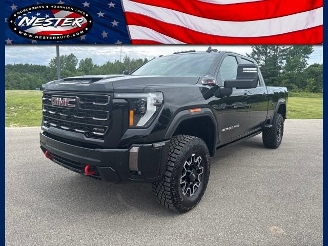 2024 GMC Sierra 2500 HD AT4X in Onyx Black — front three-quarter view