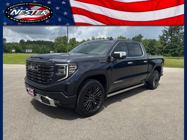 2022 GMC Sierra 1500 Denali Ultimate in Titanium Rush Metallic — front three-quarter view