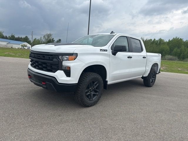 2026 Chevrolet Silverado 1500 Custom Trail Boss in Summit White — front three-quarter view