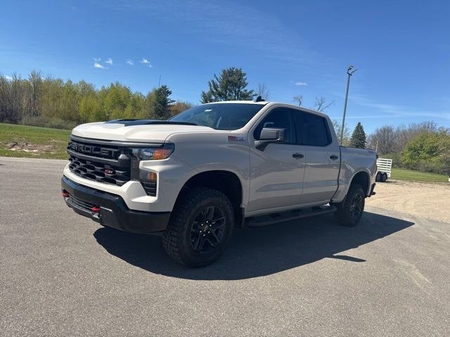 2026 Chevrolet Silverado 1500 Custom Trail Boss in White Sands — front three-quarter view