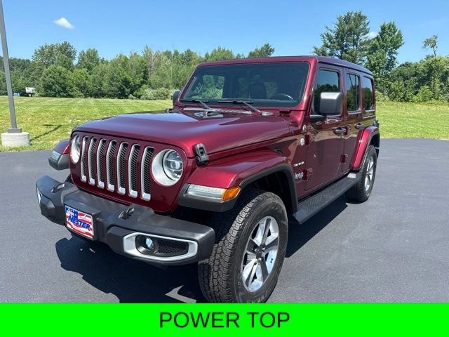 2021 Jeep Wrangler Unlimited Sahara in Maroon — front three-quarter view