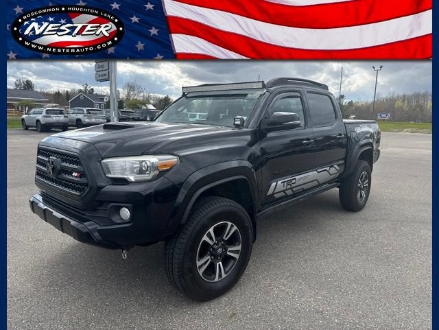 2016 Toyota Tacoma SR in Black — front three-quarter view